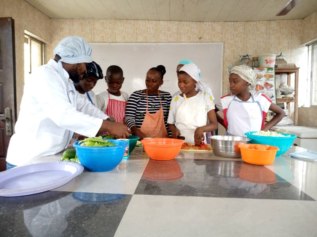 Children Cooking With A Chef